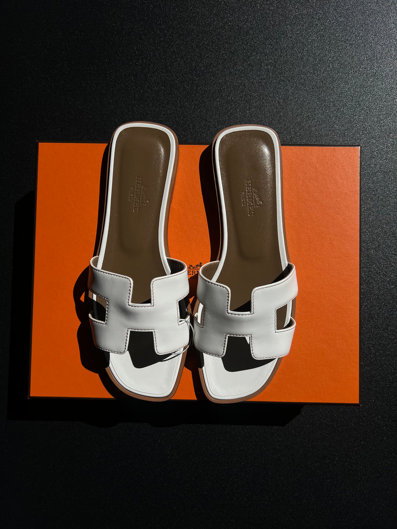 Mules Hermès Oran blanche / marron