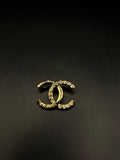 Broche Chanel doré/strass