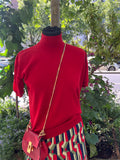 Pull Chanel col montant rouge
MC