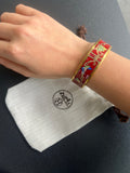 Bracelet Hermès céramique
rouge avec housse