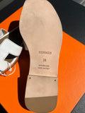 Mules Hermès Oran blanche / marron