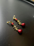 Boucles d'oreilles pendantes perles Chanel