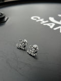 Boucles d'oreilles CC tressées Chanel