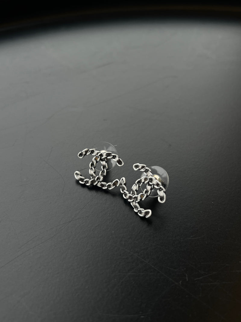 Boucles d'oreilles CC tressées Chanel