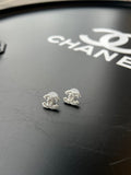 Boucles d'oreilles CC strass Chanel