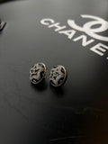 Boucles d'oreilles ovales étoiles Chanel