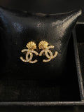 Boucles d’oreilles coquillages CC Chanel