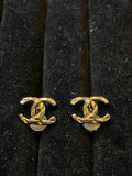 Boucles d’oreilles dorées Chanel CC